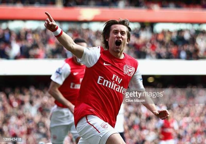 LONDON, ENGLAND - FEBRUARY 26: Tomas Rosicky of Arsenal celebrates his goal during the Barclays Premier League match between Arsenal and Tottenham Hotspur at Emirates Stadium on February 26, 2012 in London, England.  (Photo by Clive Mason/Getty Images)